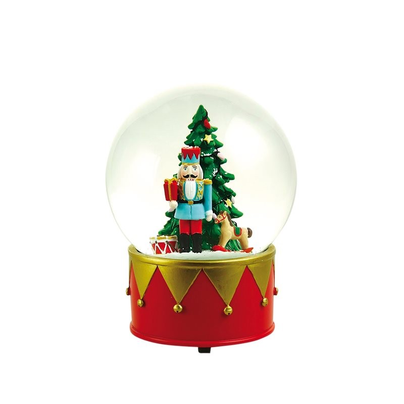Snowglobe with a nutcracker and a christmastree