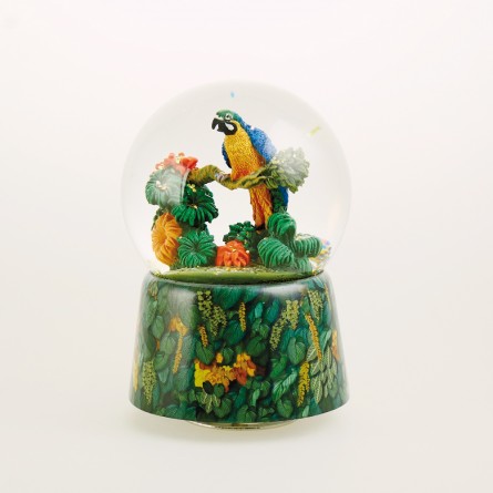 Glitter globe music box parrot