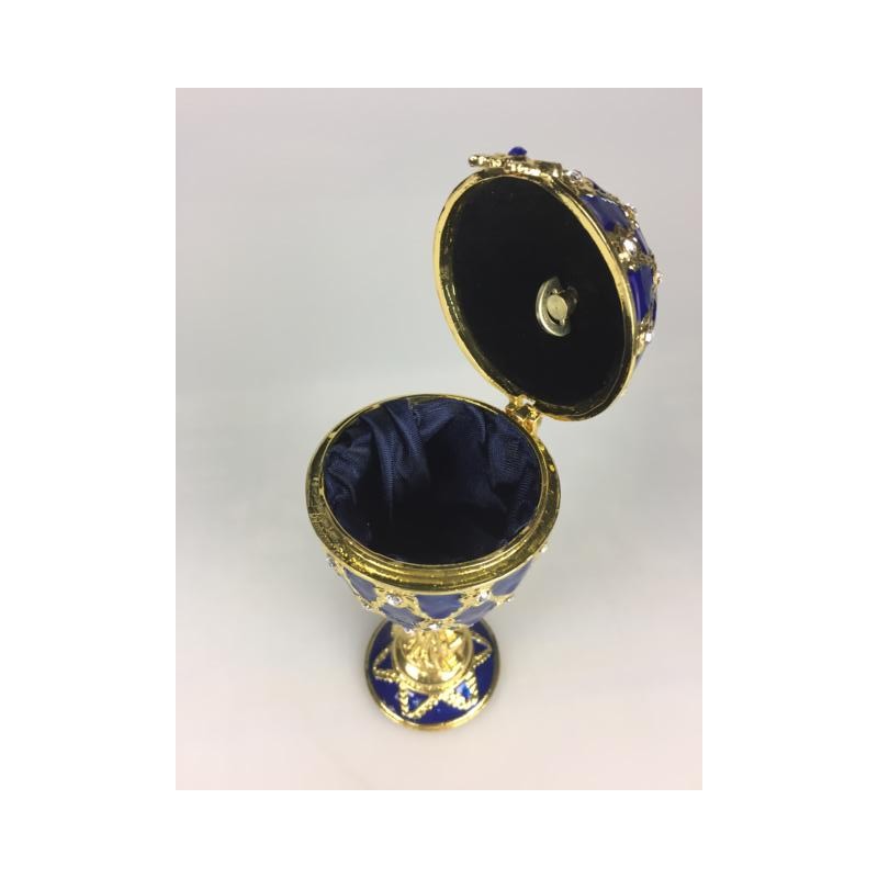 Blue jewelry egg in Fabergé style