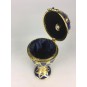 Blue jewelry egg in Fabergé style